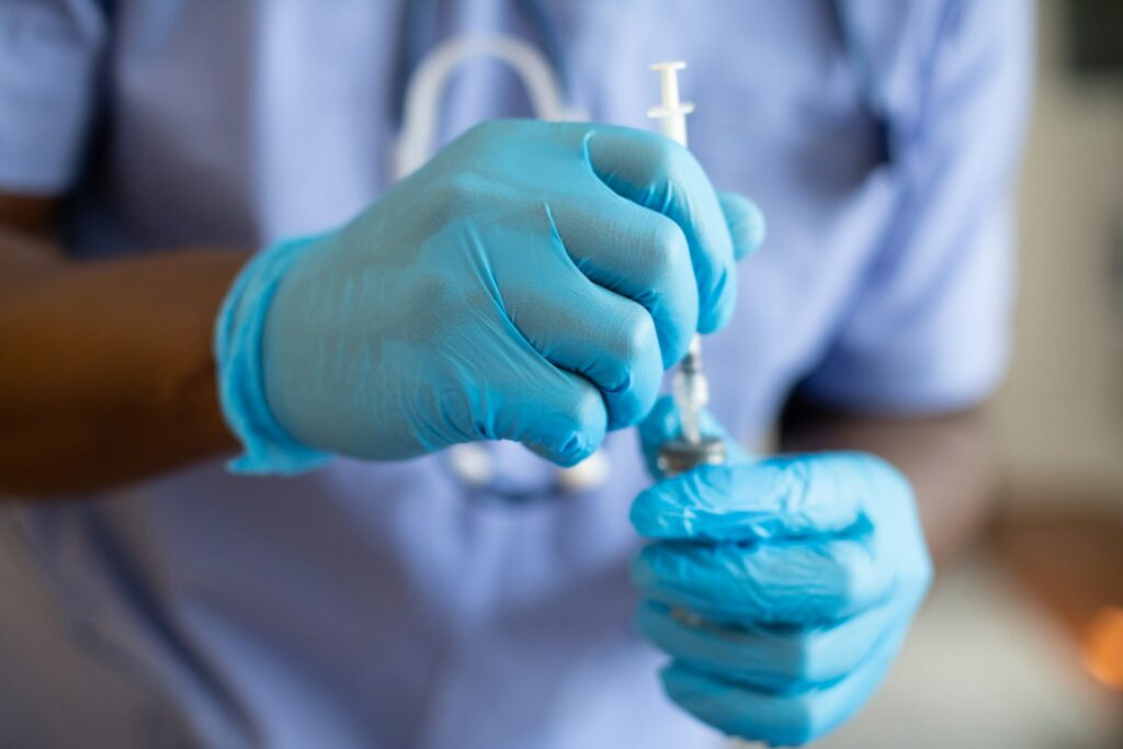 nurse getting vaccination ready